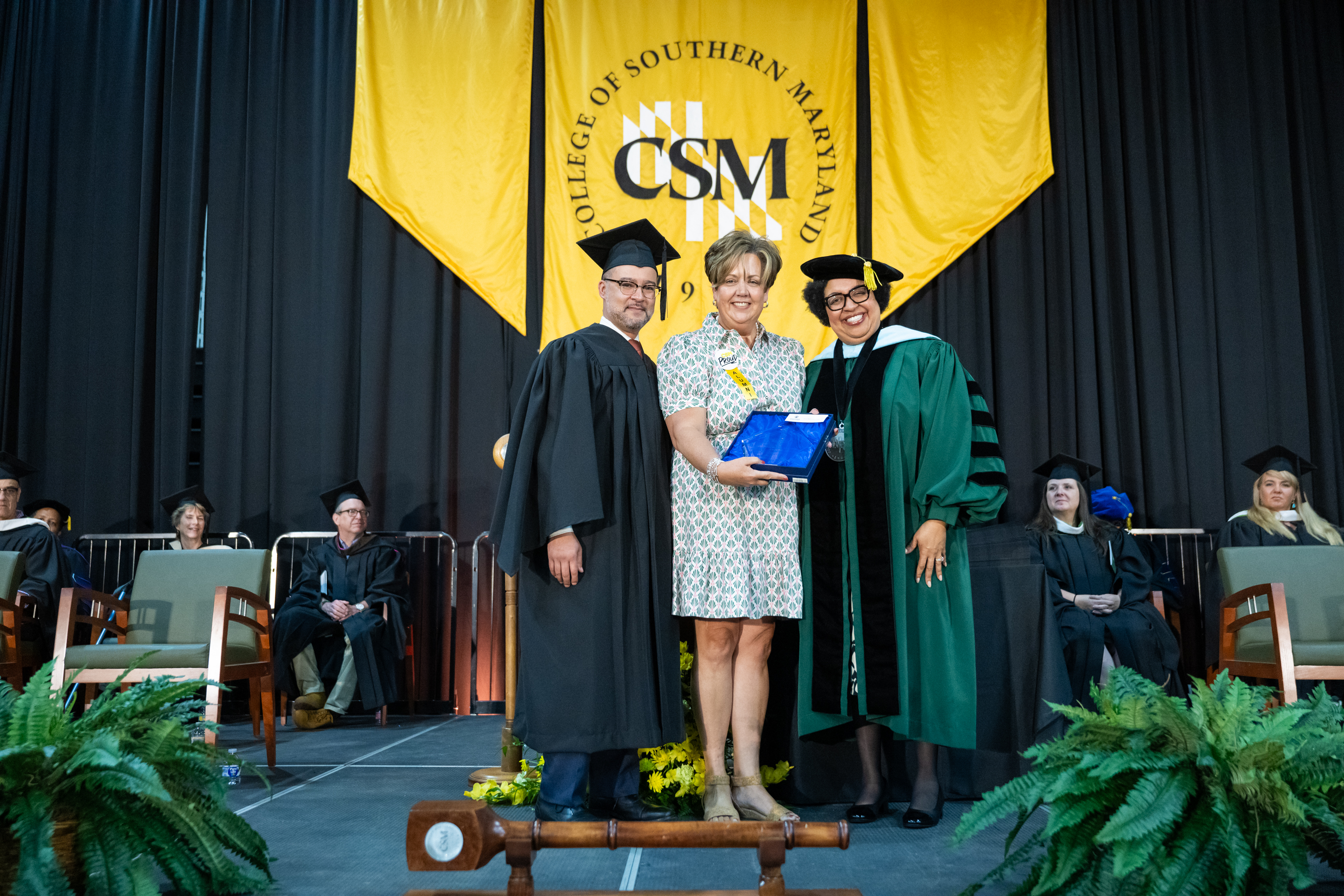 Pictured: CSM Foundation Chair Trey Proctor, Kelly Robertson-Slagle, and CSM President Dr. Yolanda Wilson