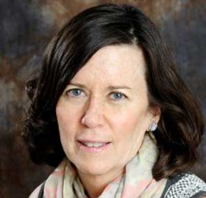 photo of white woman wearing a flowered scarf with dark hair