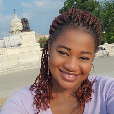 Selfie of CSM student Assetou Gassama with the Capitol Rotunda in the background