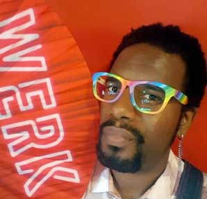 young african american man in rainbow glasses