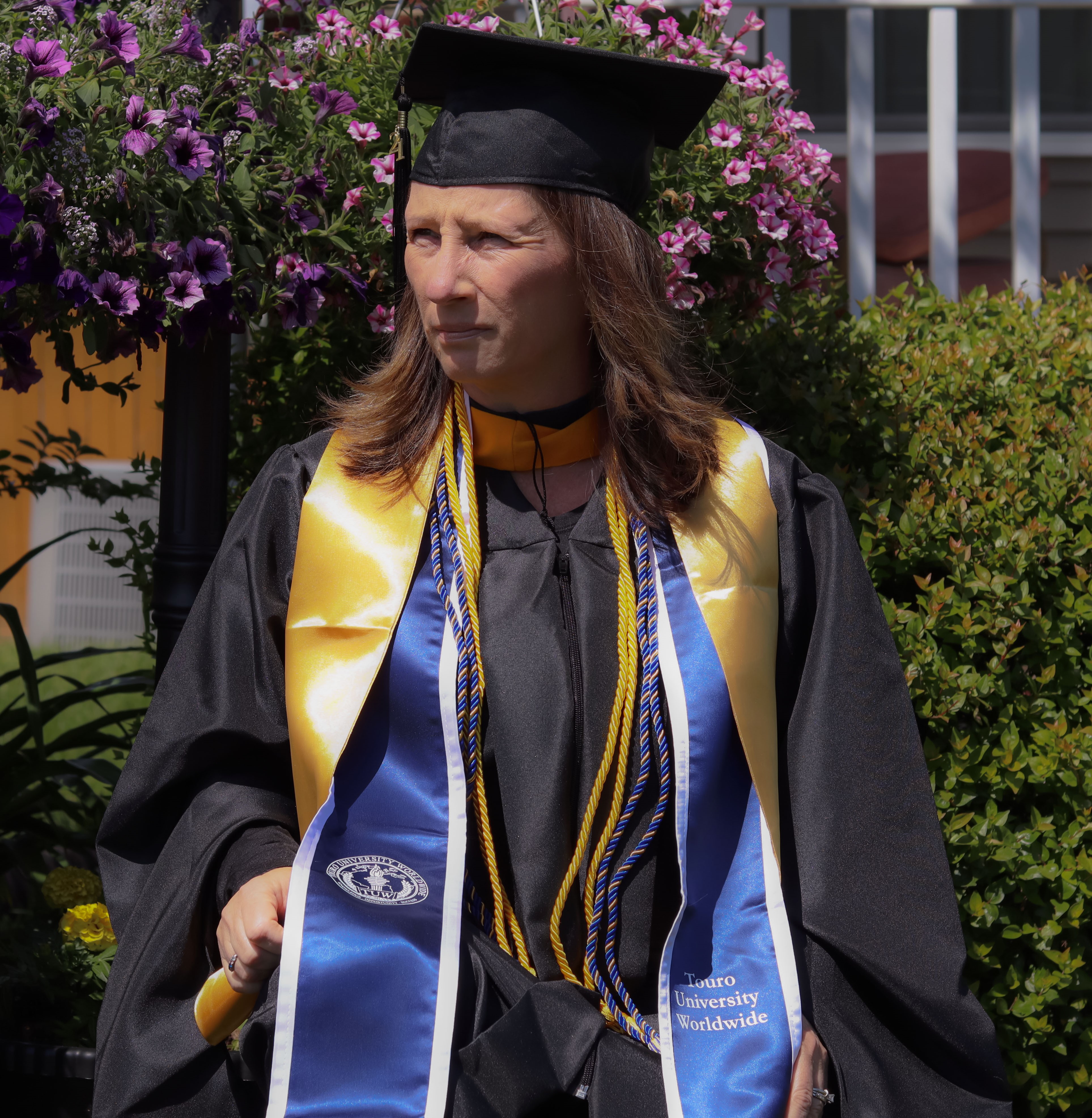 CSM professor Lynn Williams in graduation regalia