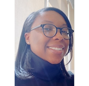 young african american woman with glasses smiling