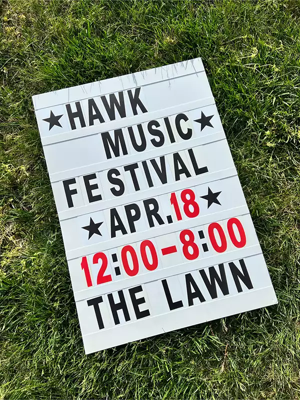 Sidewalk sign advertising the Music festival