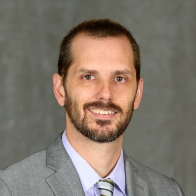 A professional headshot of CSM accounting instructor Dustin Musser