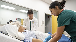 two nurses in simulation lab
