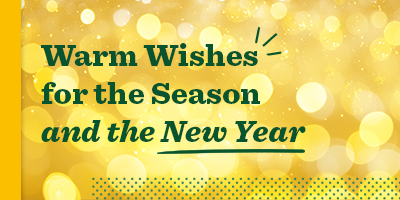 Warm Wishes for the Season and the New Year, showing lit gold bulbs in the background